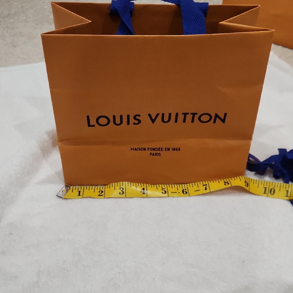 Louis Vuitton Bold Orange Bag with Blue Handles